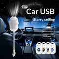 Galaxy star projector night light illuminating a bedroom ceiling